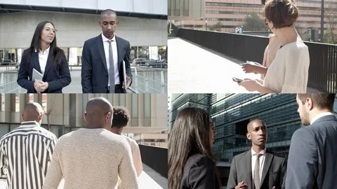 Citizens with digital devices walking outside in business area Stock Footage 130016114