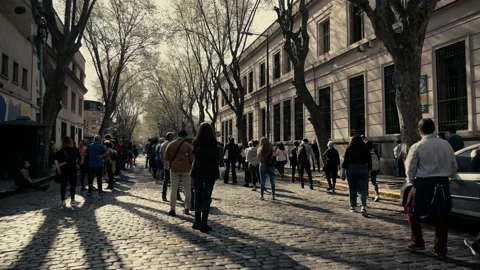 Citizens lining up outside the school to vote Stock Footage 160927753