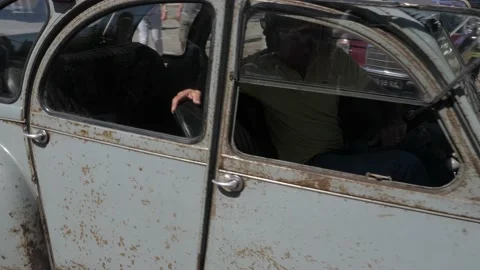 Citroën 2CV driving backwards at Oldtimer festival Video stock 200419464