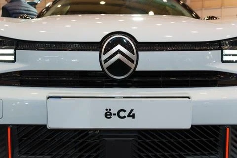 Citroen e-C4 EV front bumper logo and badge close-up at ECAR Show 2026 Stock Photos