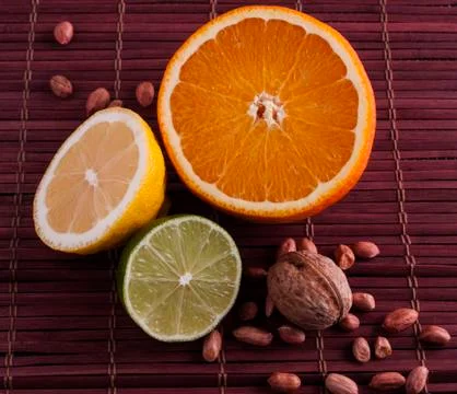Citrus and nuts Stock Photos