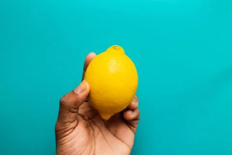 Citrus on a blue background Stock Photos