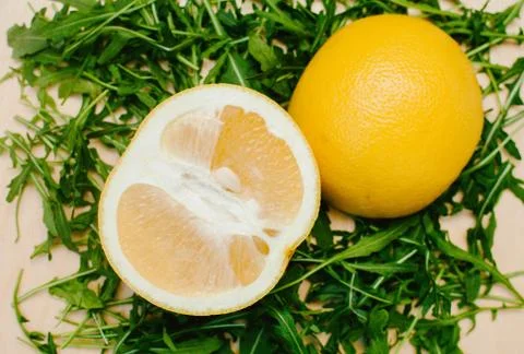 Citrus fruit on Arugula Stock Photos