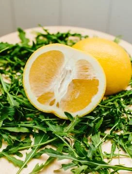 Citrus fruit on Arugula Stock Photos