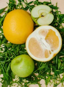 Citrus fruit on Arugula Stock Photos