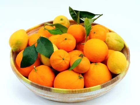 Citrus fruit in the basket Stock Photos