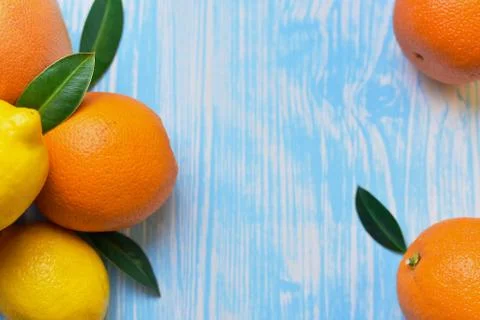 Citrus fruit lying on the table Stock Photos