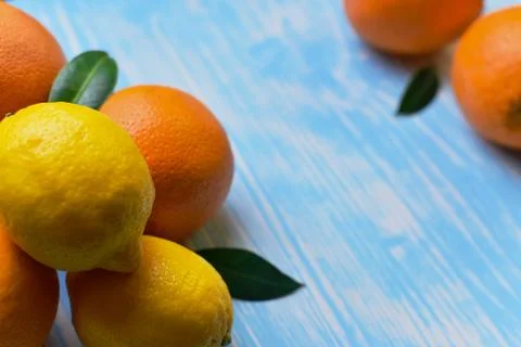 Citrus fruit lying on the table Stock Photos