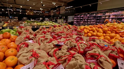 Citrus fruit section in Super U supermarket, Dijon, France. Stock Footage 329439467