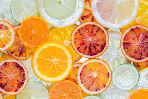 Citrus fruit slices as background Stock Photos