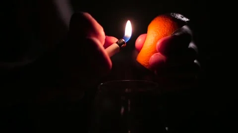 Citrus juice flashes on fire Stock Footage 61786257