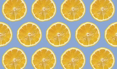 Citrus pattern isolated on blue background Stock Photos