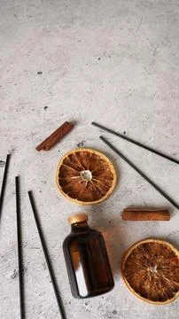 Citrus reed diffuser with cinnamon, dry orange. Parfum for home. Stock Photos