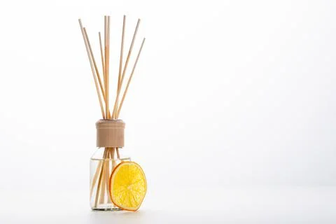 Citrus reed diffuser for home on white background Stock Photos