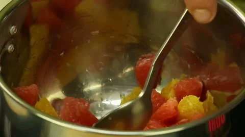 Citrus slices cooked in a pan Stock Footage 61453926
