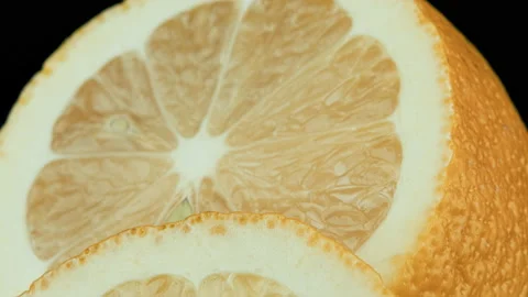 Citrus Slices On The Table. Lemon Sliding Macro Shot Stock Footage 149083698