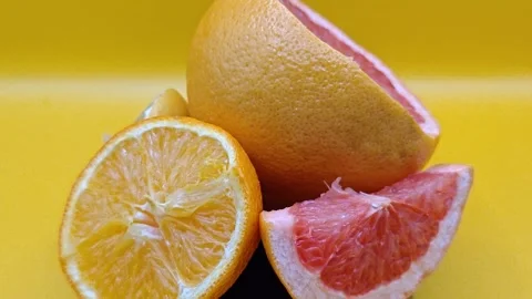 Citrus on yellow Video stock 330969955
