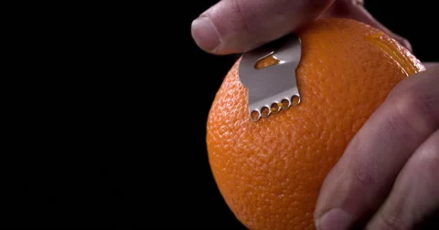 Citrus zester on dark background Stock Footage 55880280