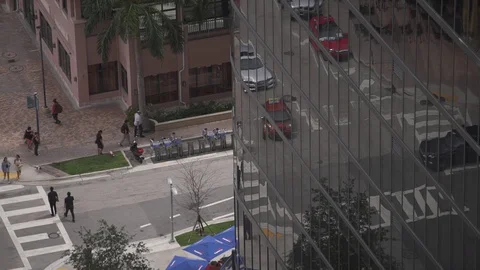 City activity reflection on windows of building Stock Footage 128079492