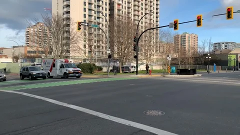 City Ambulance Intersection Emergency Motion Transportation Road Scene Traffic Stock Footage 120647224
