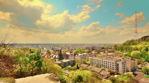 City and floating clouds. Panorama. Time lapse. 4k and full HD. 動画素材 50991827