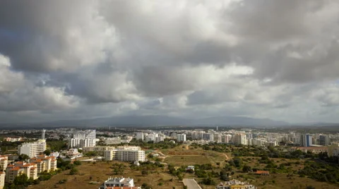City and mountain with clouds flying over. Portimao, Monchique. Stock Footage 64682478
