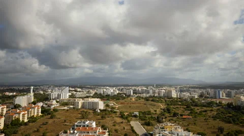 City and mountain with clouds flying over. Portimao, Monchique. Stock Footage 64682492