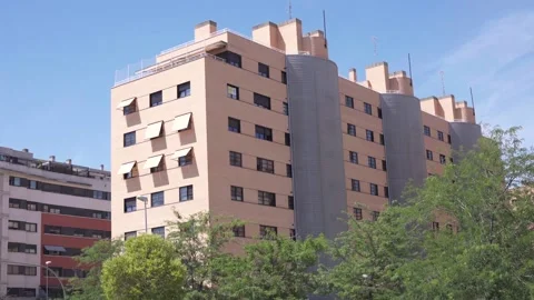 City apartment complex under bright sunlight 스톡 동영상 336558686