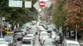 City artery, cars drive like blood in vein, narrow street HD Footage