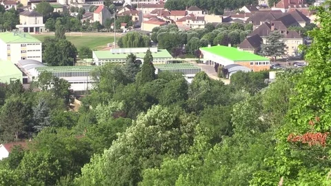 City behind trees Stock Footage 76950845