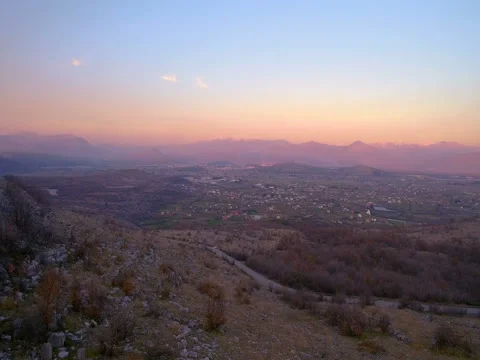 City between  mountains and  view of  sunset from  height Stock-Footage 74683715