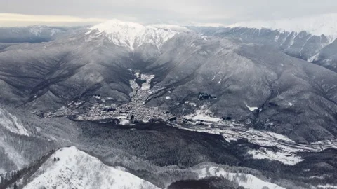 City Between Mountains In Winter Stock Footage 246630198