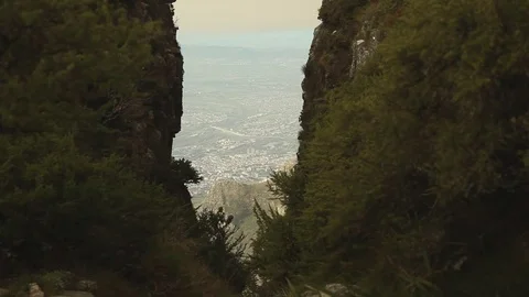 City between two rock walls Stock Footage 73660137