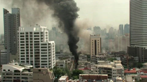 CITY BURNING Terrorist Bomb Smoke Riot Fire War Bangkok in Flames Bangkok 2010 Stock Footage