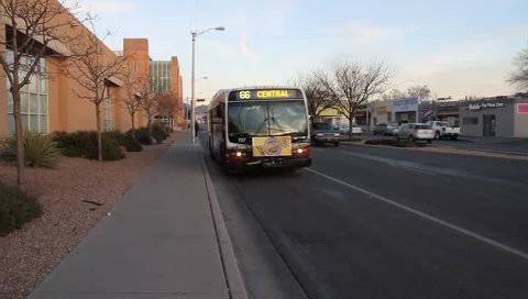 City bus passes by Stock Footage 1061940