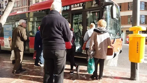City Bus picking up Passengers Stock Footage 100969724