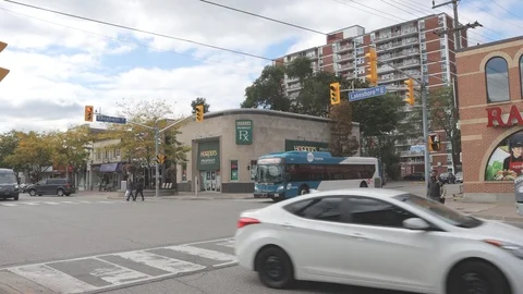 City bus turning at intersection Stock Footage 117211869