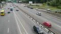 City cars traffic, three lanes street, road junction, daytime HD Footage