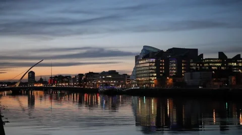 City center and river Liffey with Samuel Beckett Bridge during sunset Stock Footage 59134797