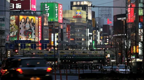 City centre road traffic and commuters, Shinjuku, Tokyo City centre, Japan, Asia Stock Footage