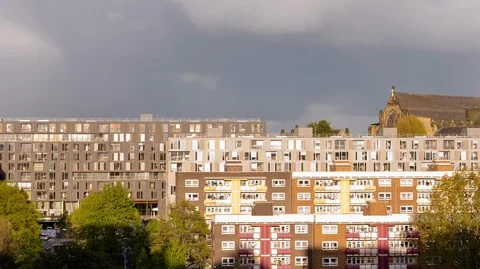 City Centre Timelapse, Sunset with Mixed Weather Over Apartments 4K Stock Footage 99738180