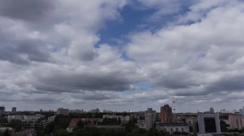 City Clouds in motion 2 4K Stock Footage 53709891