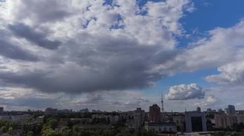 City Clouds In Motion 3 4K (with rain) Stock Footage 54061454