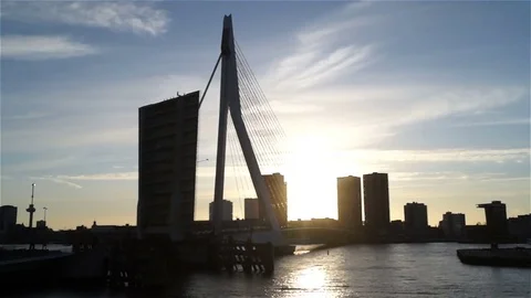 City clouds ship river sky sun bridge Stock Footage 73602300