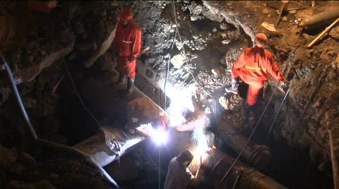 City construction workers welding pipe close up Stock Footage 338594