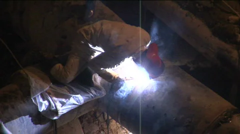 City construction workers welding pipe Stock Footage 341596