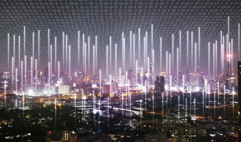 A city covered by binary code with cellular signal everywhere sending into .. Foto stock