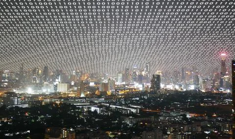 A city covered by binary code. Wireless network and Connection technology c.. 写真素材
