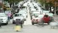 City crossing in rush hour, people mass cross road, cars HD Footage