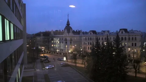 City Crossing Through the Window in the Evening Stock Footage 260471597